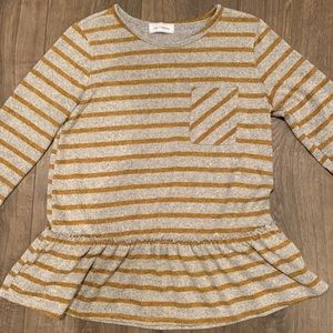 Women’s ruffle bottom stripes peplum shirt